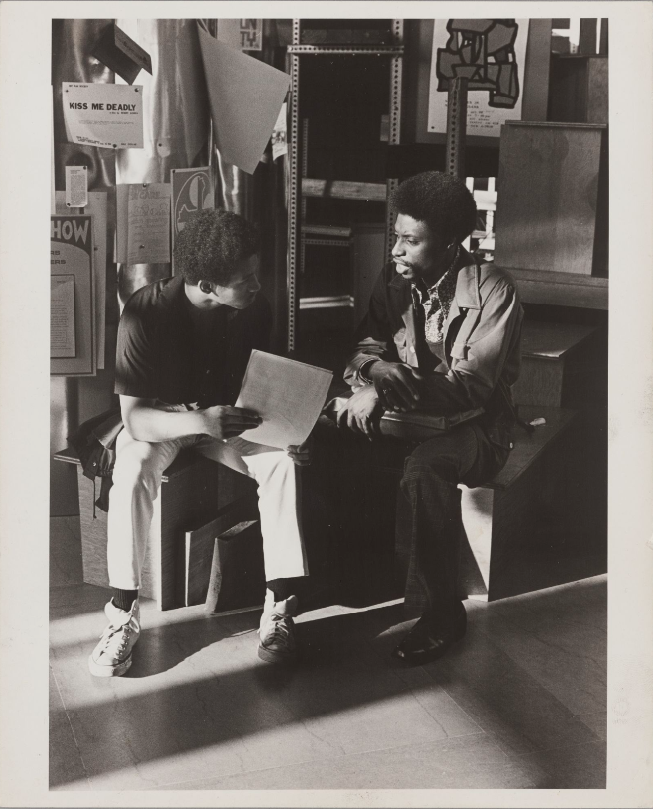 Two young men in conversation, ca. 1978