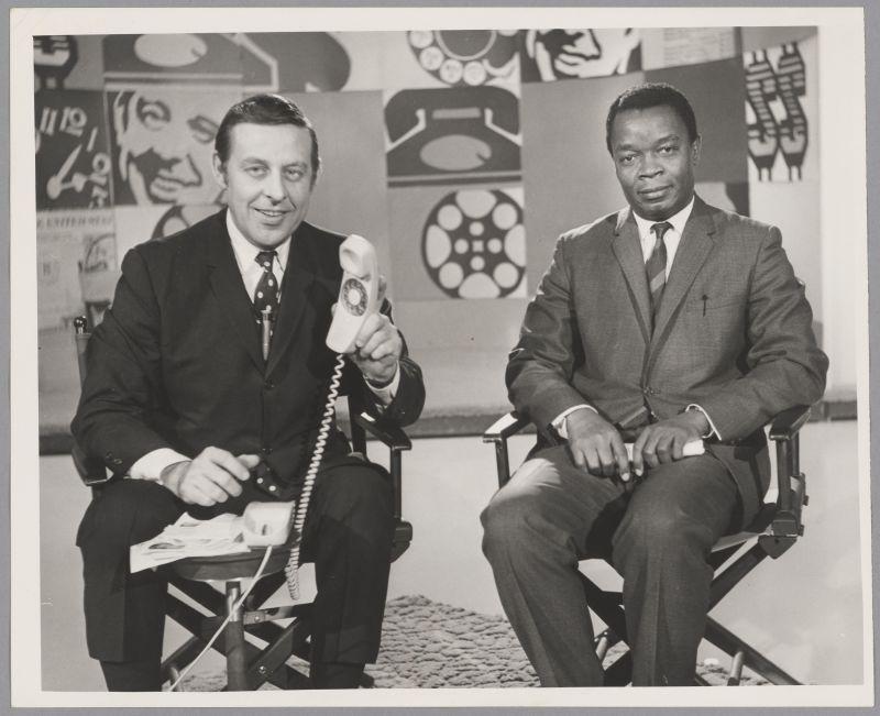 Udo Ukweni Udo with Ed Miller on set of "Dialing for Dollars" TV show, ca. 1968